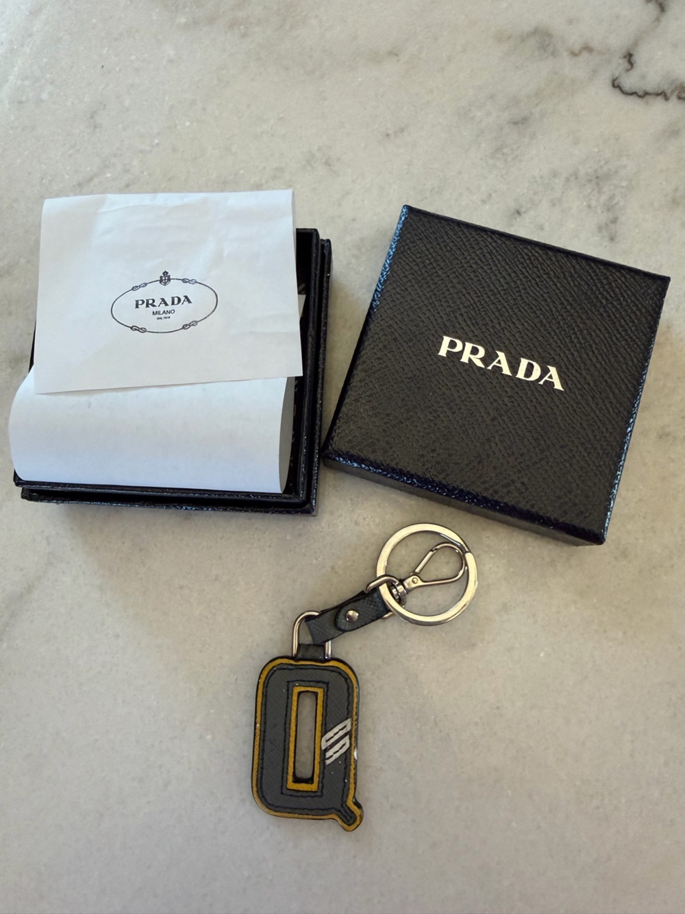 Prada grey and Yellow  'Q' Leather Keychain